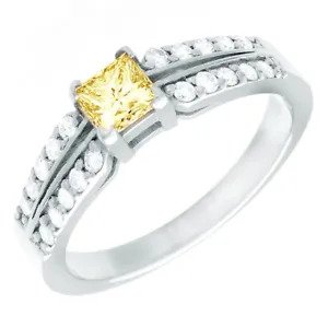 A diamond ring with a yellow center stone.