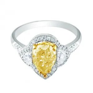 A diamond ring with a yellow center stone.