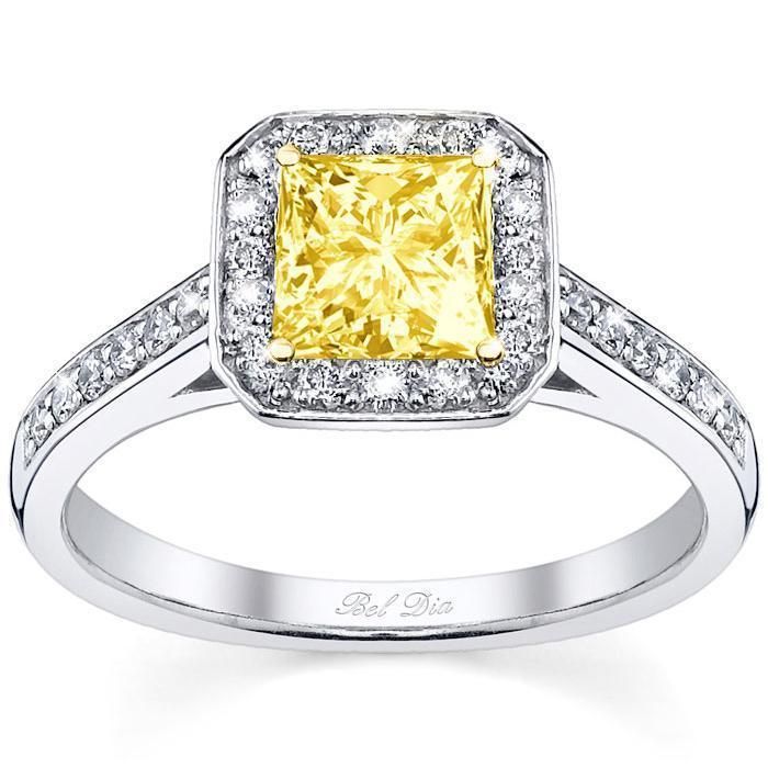 A yellow diamond is surrounded by white diamonds.